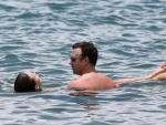 Olivia Wild Kiss and photos of Canoodle in the wasters of Hawaii and Jason Sudekis