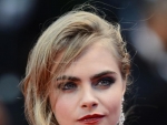Cara Delevingne Wears Black Lace Burberry Dress at Cannes Film Festival