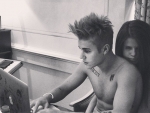 Justin Bieber Posts Shirtless Photo with Selena Gomez