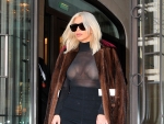 Kim Kardashian Curves in Sexy Bondage Dress