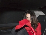 Amal Clooney Flashes the Paparazzi on Date Night With Famous Friends