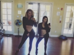 Khloe Kardashian works for Kourtney a ‘MILF’ in Ab-Tastic Gym Selfie