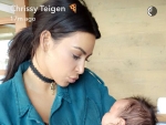 Kim & Kanye Meet Chrissy Teigen & John Legend’s Baby Watch