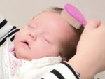 10 Week Old Baby Has 2-Hour Hair Routine