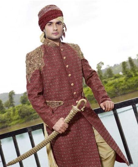 Maroon Brocade Embroidered Wedding Sherwani and swords in Hand