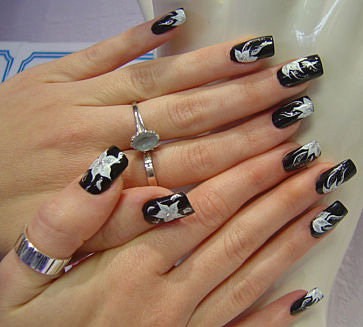 black charm women nail art black charm women nail art
