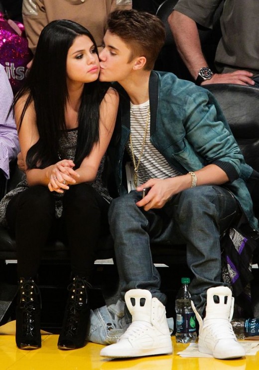 Selena Gomez and Justin Bieber at a basketball game between the San Antonio