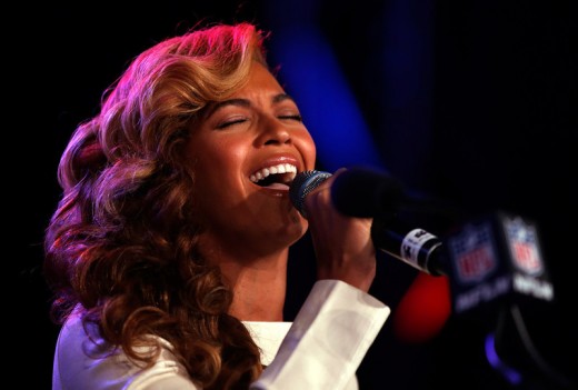 Singer Beyonce sings the national anthem