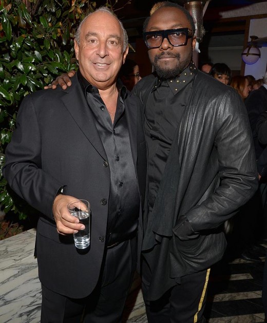 Sir Philip Green standing with William