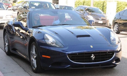 Djimon Hounsou & Kimora Lee Simmons in Ferrari California Photos