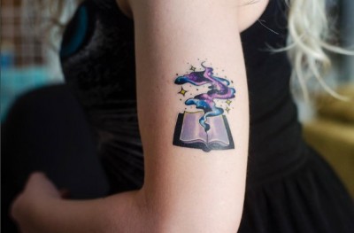 10-youreinbrookelynn-arm-book-galaxy-tattoo